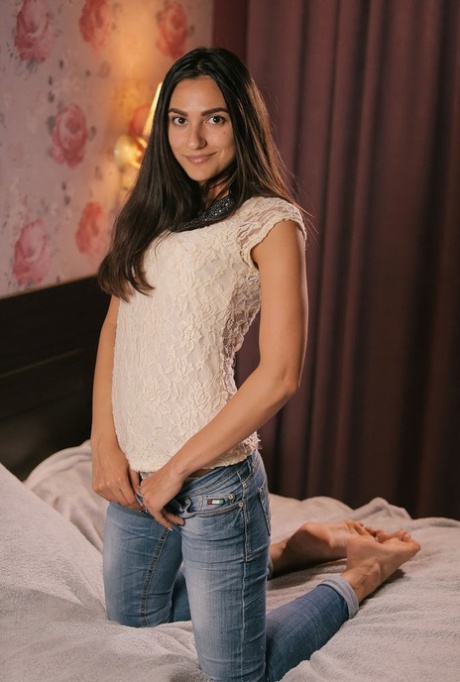 Horny Cira Nerri strips jeans  t-shirt to expose her tin tits  rub her clit