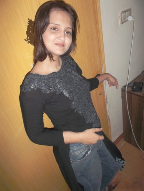 Hot Indian model in tight jeans posing seductively in sexy lace bra