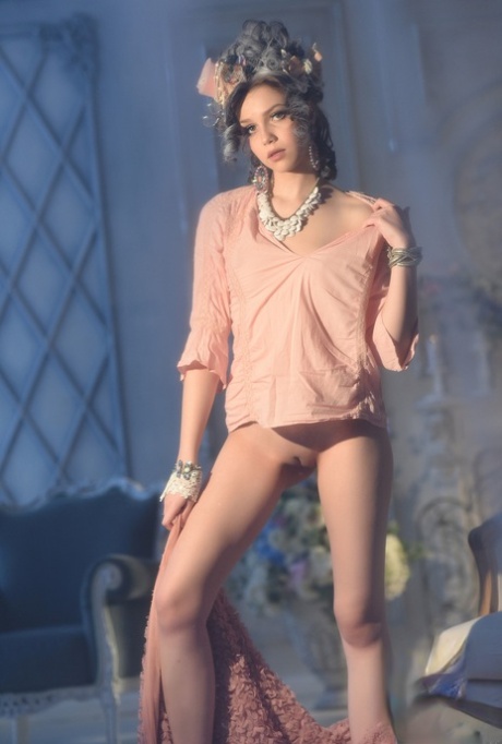 Russian beauty Lily Sands gets rid of her hot dress  poses naked