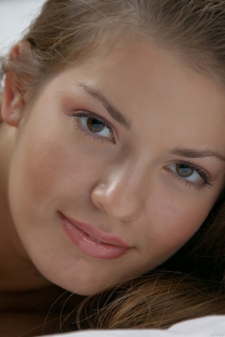 Breathtaking teen Sabina B showing her fantastic body  trimmed cunt in a solo