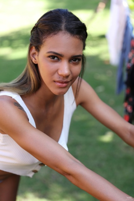 Glam Latina teen Abril showing her delicious pussy  juicy tits outdoors